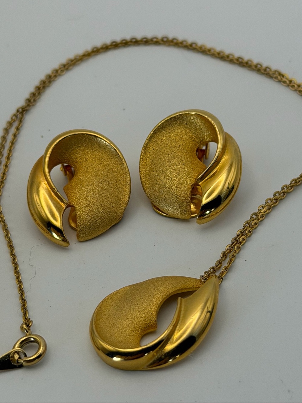 Gold-Tone Matte Sculpted Abstract Necklace and Clip-On Earrings Set